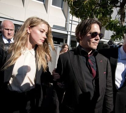 Amber Heard doa dinheiro conseguido com divórcio 