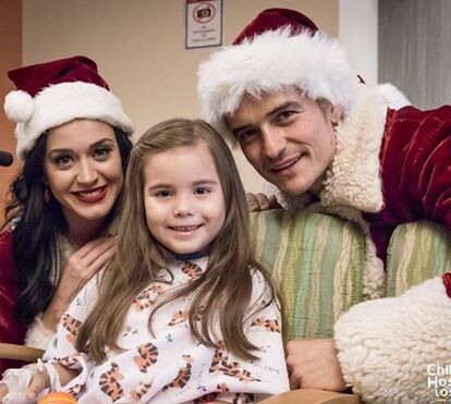 Katy Perry e Orlando Bloom surpreendem crianças doentes