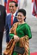 O presidente indonésio, Joko Widodo e a mulher, Iriana
