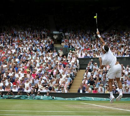 Simples mas muito elegante. Kate arrasa na Wimbledon ganha por Roger Federer