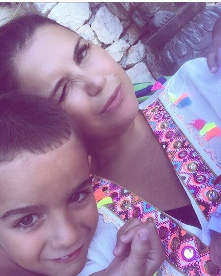 Katia Aveiro e os filhos
