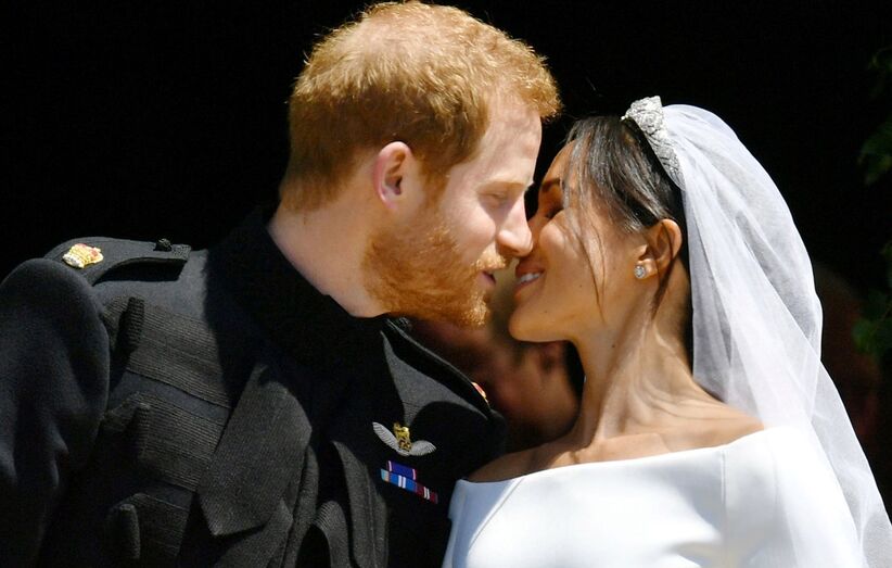 O primeiro beijo de Harry e Meghan enquanto marido e mulher
