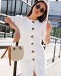 Street style saias e vestidos com botões