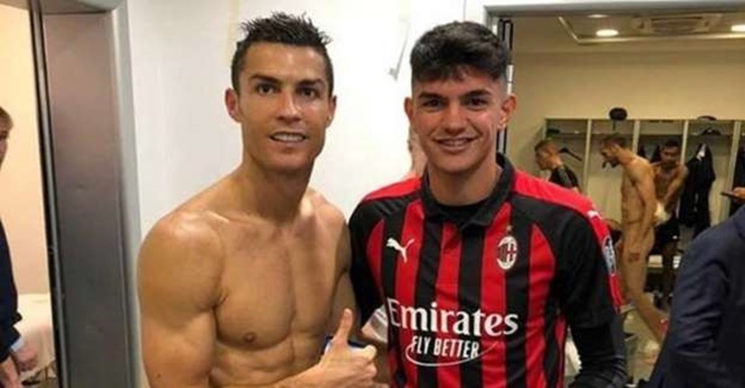 CR7 posa com jovem fã nos balneários... sem reparar que estava um ...