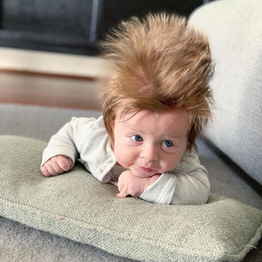 bebé com cabelo enorme, austrália