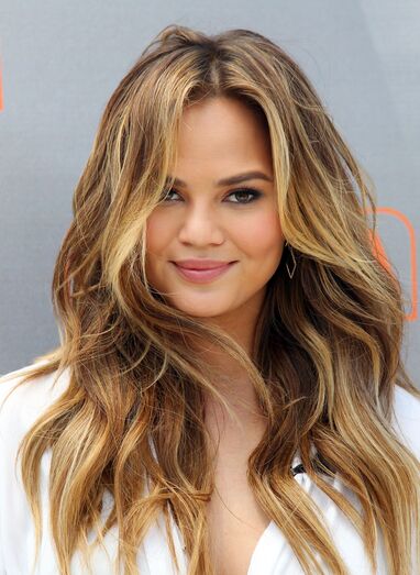 Chrissy Teigen - Beach waves