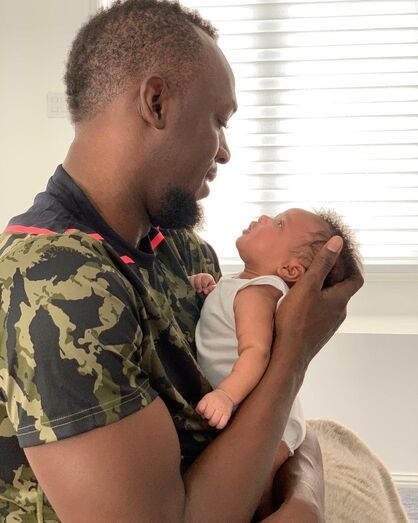 Usain Bolt com a mulher, Kasi, e os filhos