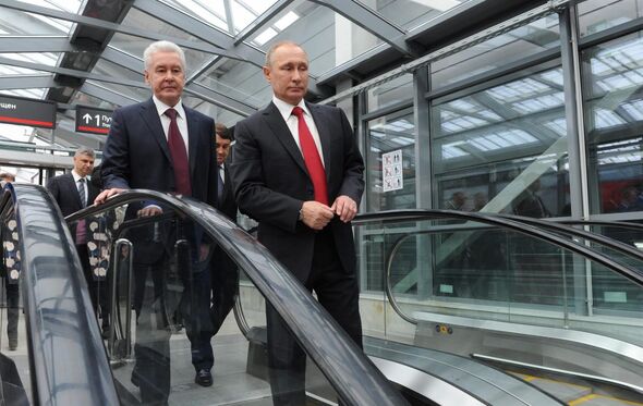 Vladimir Putin e o presidente da Câmara de Moscovo, Sergei Sobyanin