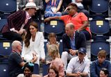 Os príncipes William e Kate com a filha, Charlotte