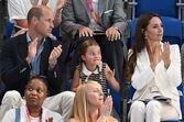 Os príncipes William e Kate com a filha, Charlotte