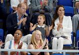 Os príncipes William e Kate com a filha, Charlotte
