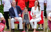 Os príncipes William e Kate com a filha, Charlotte