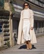 Como as mulheres com mais de 40 anos usam saias midi… sem perder elegância
