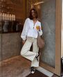 Atrevida e coquete! A blusa dos "lacinhos" que todas as mulheres querem usar nesta primavera