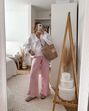 Atrevida e coquete! A blusa dos "lacinhos" que todas as mulheres querem usar nesta primavera