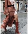 Vestidos e botas de cano alto… a grande tendência deste outono para as mulheres com mais de 50 anos