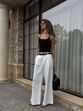 Ficar elegante com sapatos rasos? Ténis, mocassins ou sandálias são opção para looks requintados