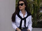 Camisola nos ombros: moda regressa como símbolo de elite