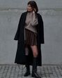 Para usar com moderação! Botas altas e mini-saia ou micro calções