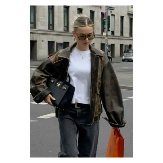 Se é para gastar dinheiro então invista na peça-estrela da temporada: o blusão de pele castanha