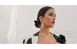 Na Feira de Abril em Sevilha com roupa que se vende em todas as lojas