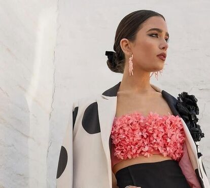 Na Feira de Abril em Sevilha com roupa que se vende em todas as lojas