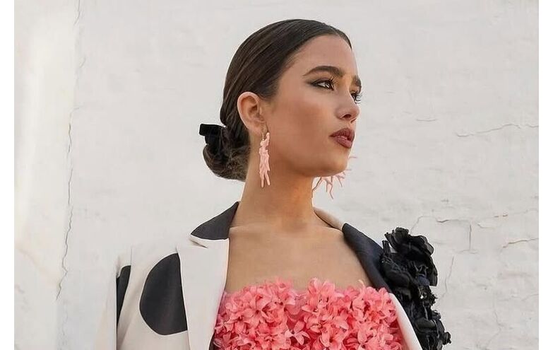 Na Feira de Abril em Sevilha com roupa que se vende em todas as lojas