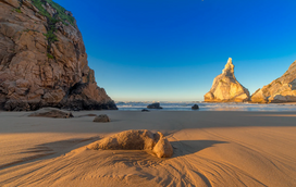 Cinco praias paradisíacas em Lisboa longe da confusão