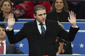 Barron Trump waves at an indoor Presidential Inauguration parade event in Washington, Monday, Jan. 20, 2025. (AP Photo/Matt Rourke)