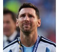 Argentina's Lionel Messi (10) cries at the end of the World Cup final soccer match between Spain and Argentina in