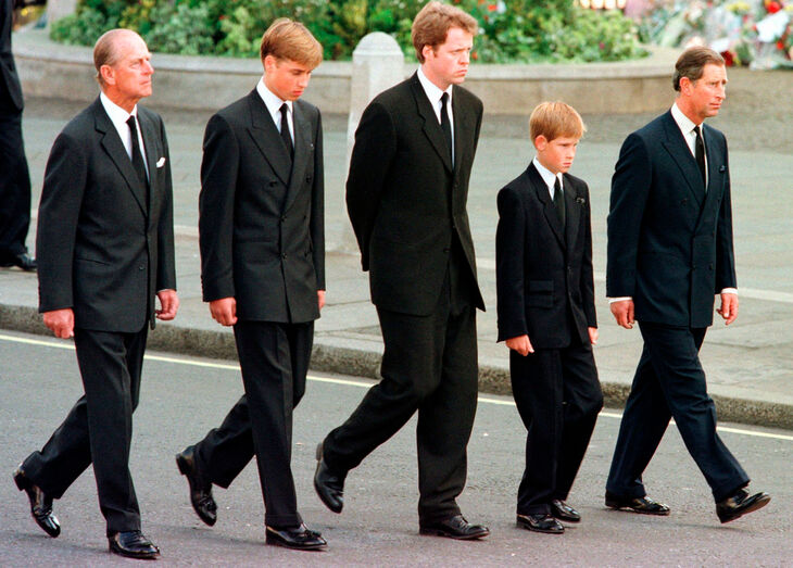 A família no funeral da princesa